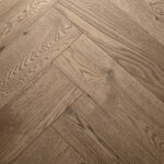 Highclere Biscotti Oak Herringbone Wood Flooring